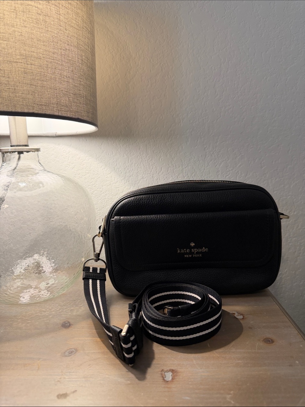 kate spade black pebbled leather camera crossbody with striped strap